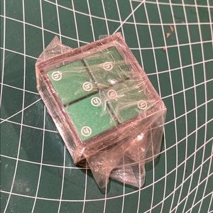 Hidden NY dice green